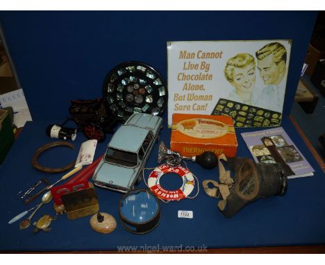 A quantity of miscellanea including gas mask, car horn, model car, New Zealand coin plaque, enamel plaque etc.