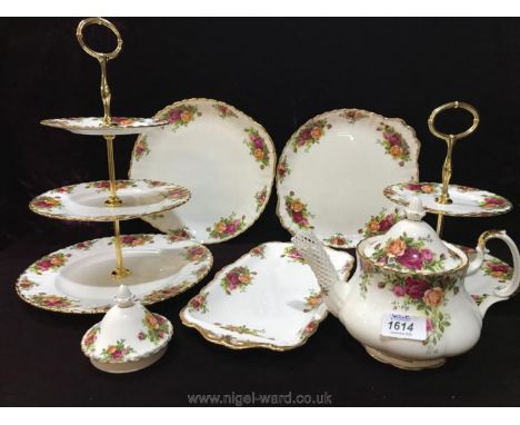 A quantity of Royal Albert "Old Country Roses" including three tier and two tier cake stands, 12'' sandwich tray, two bread a