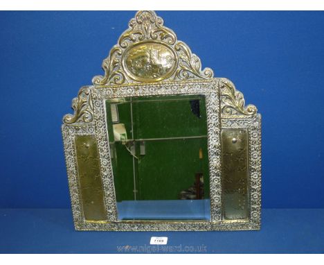 A late 19th c. highly decorative brass framed bevelled glass hall Mirror having Vignette of windmill.