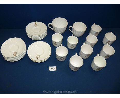 A quantity of Royal Tuscan coffee cans and saucers in white china a member of the Wedgwood Company and some being Coalport.
