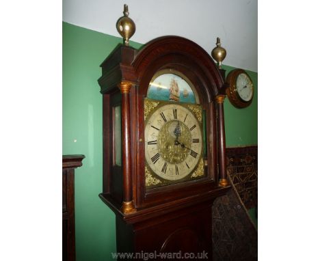 A fine quality Oak cased Long-case Clock having a brass face with three rocking galleons under full sail on azure seas to the