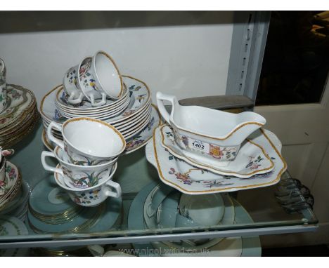 A part set of Wedgwood Devon Rose to include a large plate and sauce boat with square plate, five cups, six saucers and seven