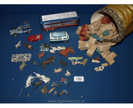 A quantity of Britains farm animals, Corgi lorry and TV van, a very old building blocks express carriage, farm animals etc.
