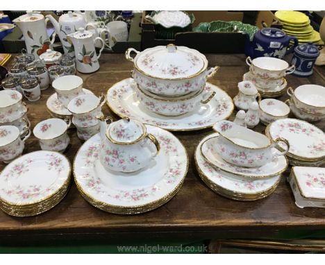 A Paragon "Victoriana Rose" dinner/tea service, white ground with pink rose and gilt rims, comprising large meat platter, six