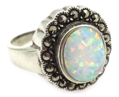 Silver opal and marcasite ring, stamped 925 Condition Report & Further Details Click here for further images, condition, auct