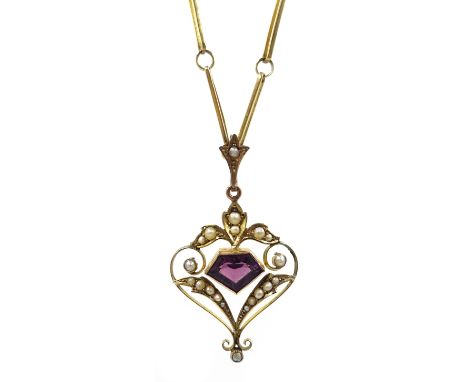 Edwardian gold amethyst and seed pearl pendant, stamped 9ct on gold trombone link chain tested 9ct Condition Report & Further