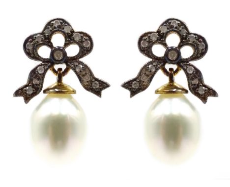 Pair of pearl and diamond pendant bow earrings Condition Report & Further Details Length = 2.2cm. Good condition.Click here f