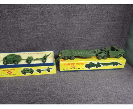 Two Dinky diecasts, 660 Tank Transporter and 697 25 Pounder Field Gun Set, both in original yellow and blue boxes