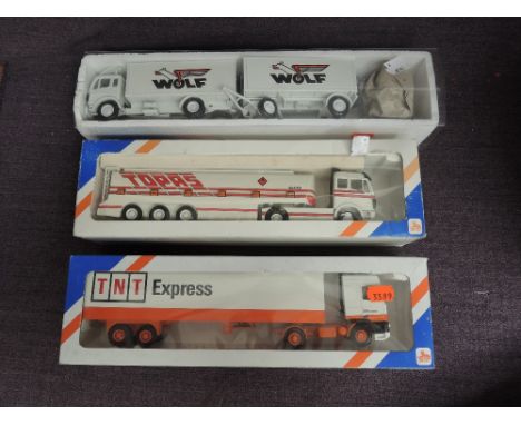 Three Lion Toys 1:50 scale diecast Wagons, TNT Express, Wolf and Topas, all boxed