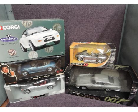 Five mixed scale diecasts, UT Models 1:18 scale BMW Z3 Roadster 007 and similar, Auto Art 007 DB5 Goldfinger, Corgi 1:18 MG a