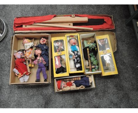 Nine Pelham SM and Similar Puppets including Dragon, Policeman, Old Woman, Policeman etc, five with boxes along with a  Pelha