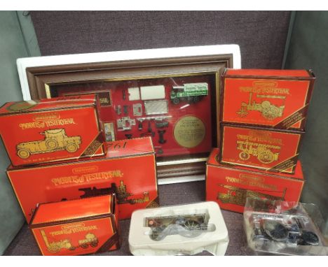 A shelf of Matchbox Models of Yesteryear diecasts including framed Yorkshire Steam Wagon and similar Steam Related models