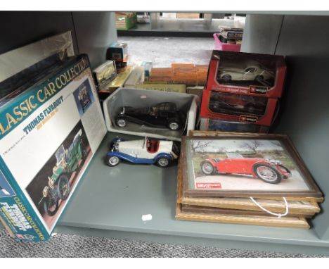 Five Burago and similar mixed scale diecast vintage Cars, four boxed, along with decorative Prints of Vintage Cars and a plas