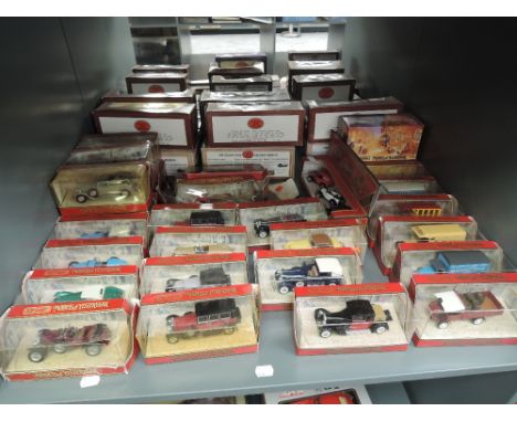 A shelf of Matchbox Models of Yesteryear diecasts, all in original window display boxes, approx 30