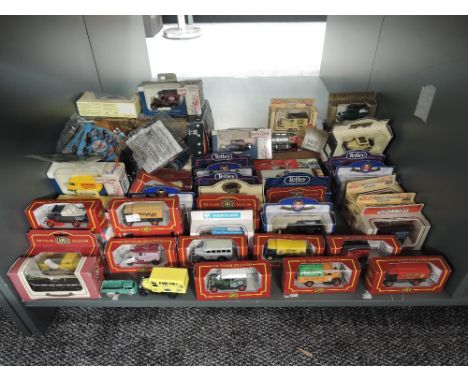 A shelf of modern diecasts including Lledo, Cameo, Trackside, Tetley, Days Gone etc, all boxed, 50+