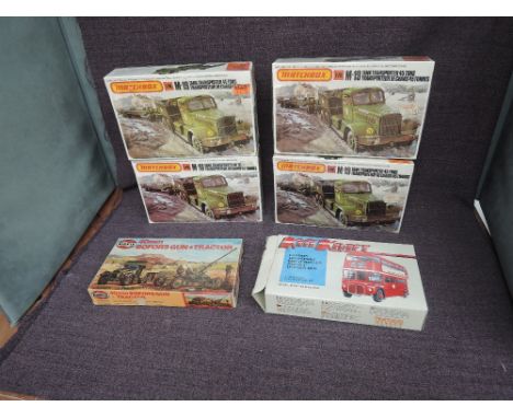 Four Matchbox 1:76 scale plastic kits, M-19 Tank Transporter 45 Tons all sealed, along with Airfix 40MM Bofors Gun &amp; Trac