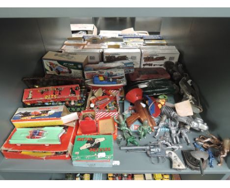 A shelf of vintage Toys and Games including 1950's Empire plastic Dream Car in original box, Telsalda plastic clockwork Hercu