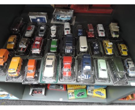 A shelf of modern foreign diecasts, all on bubble cards, approx 29