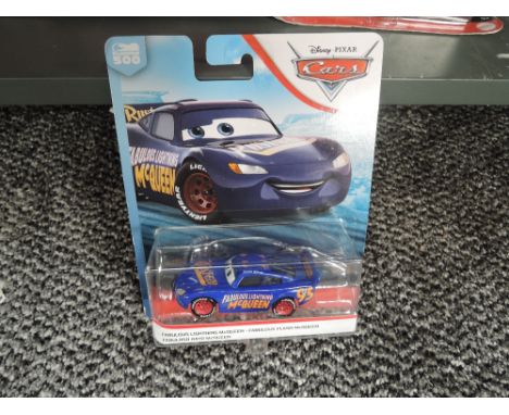 Twenty Two Mattel Disney Pixar metal Cars, all in blister packs
