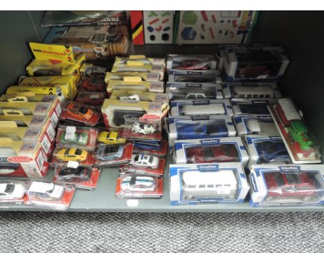 A shelf of modern diecasts including Trackside, Tesco etc, all boxed