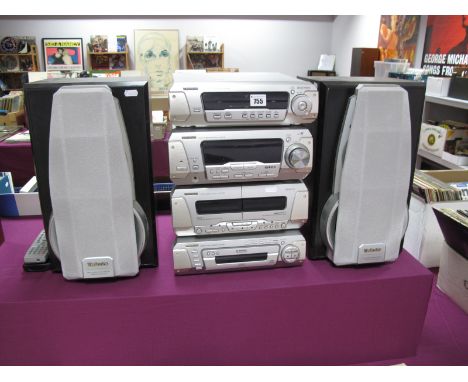 A Technics Four Section Music Stacking System, comprising amplifier SA - EH780, Sound processor SH - EH780, CD Changer SL - E