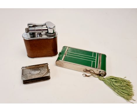 A green Art Deco style powder compact and lipstick holder, with a stamp holder and a MERLIN PRODUCTS table cigarette lighter