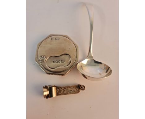 A hallmarked silver ladle, a silver cigar cutter, along with a hallmarked silver snuff box