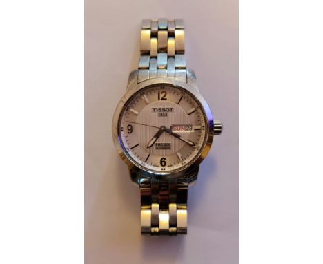 A gents stainless steel Tissot 1853 PRC 200 Automatic wrist watch, the silver-tone dial having hourly baton markers and quart
