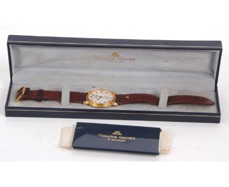 A Maurice Lacroix wristwatch, reference 26318, the watch has a manually crown wound movement, the paperwork is dated 1992, it