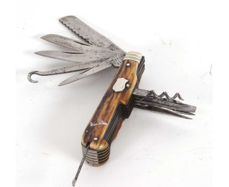 Joseph Haywood sportsmans pocket knife, with eleven tools and stag horn handle applied with a shield cartouche (tweezers miss