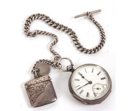 A silver pocket watch with silver albert chain and vesta case, all which are hallmarked for silver, the pocket watch is key w