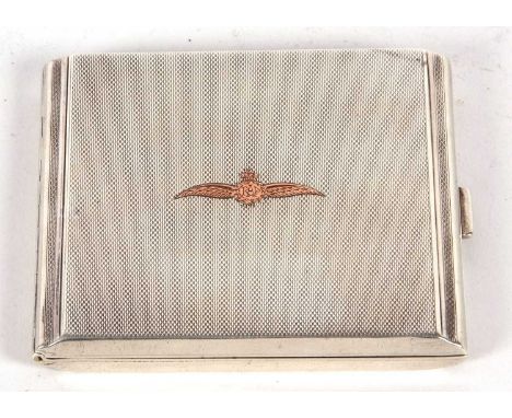 An Art Deco silver cigarette case having overall engine turned decoration, one side engraved with the RAF badge, having full 