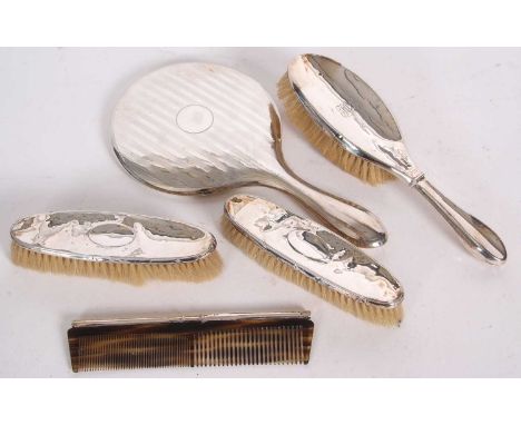 Mixed Lot:  Silver backed dressing table wares to include mirror, two clothes brushes, hair brush and comb (a/f), marks rubbe