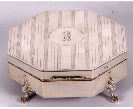 A George VI silver jewellery or ring box of octagonal form, engine turned decorated hinged lid and engraved with initials, ha