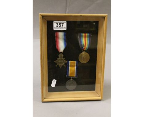 Set of Three World War I Medals with Ribbons awarded to 12182 Pte C Theobald Norf  R, mounted on a board and framed