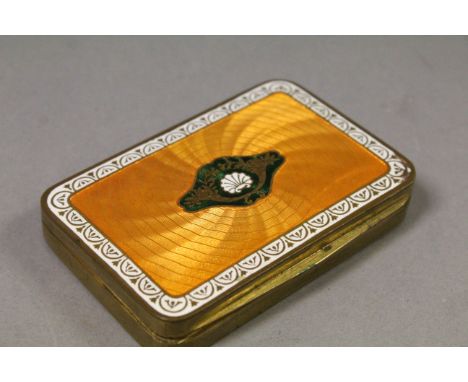 Gilt metal Snuff box with multi coloured Enamel lid