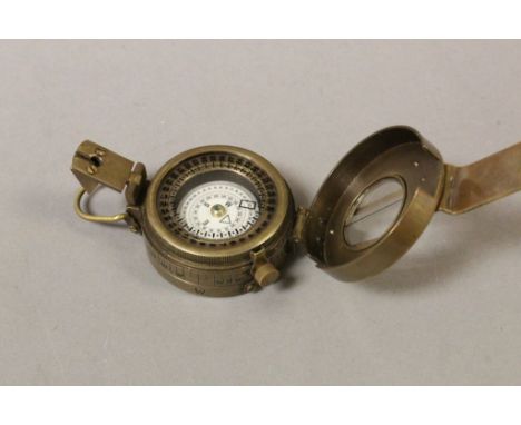 Brass compass TG Co Ltd London with crow foot mark