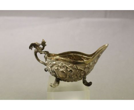 Continental Silver cream jug on tripod feet, with Dragon handle and hallmarked to base