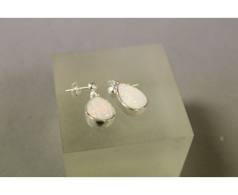 Pair of Silver pear shaped opal earrings