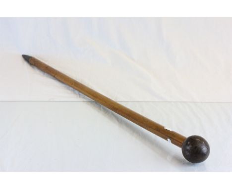 Antique 19th Century mallaca walking stick cane, the handle a coconut profusely carved