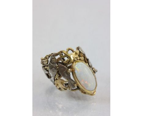 Arts & Crafts style Gold mounted Opal ring, with a Sea theme to include white metal Fish