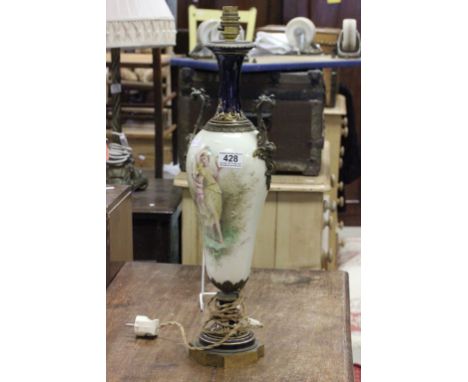 Sevres style lamp, decorated with a single lady and a cherub, with gilt brass handles and mount.  Signed C Labarre
