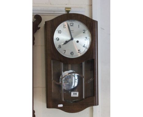 German Wehrle Silextomatico Wall Clock, Walnut cased with silvered dial, mid 20th century
