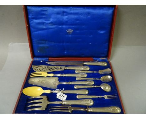 Late 19th century French Silver Handled Eleven Piece Cutlery Serving Set contained in a Blue Silk Lined Presentation Box mark