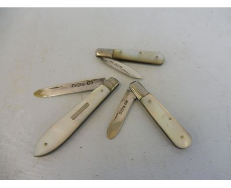 Three sterling silver and mother of pearl handled fruit knives. 