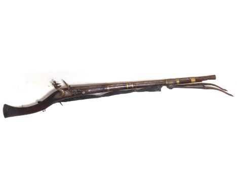 A 19th century flintlock musket with rampart stand probably Indian army. 