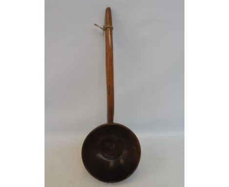 A large 19th Century Welsh turned treen fruitwood ladle.