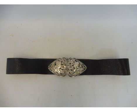 An Art Nouveau silver two piece heart-shaped belt buckle, London 1898, maker W.C. possibly William Comyns &amp; Sons Ltd. 