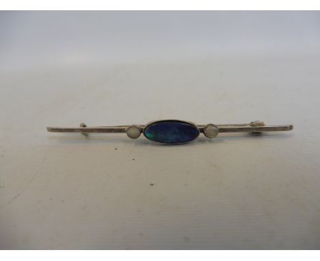 A sterling silver opal and pearl inset bar brooch.