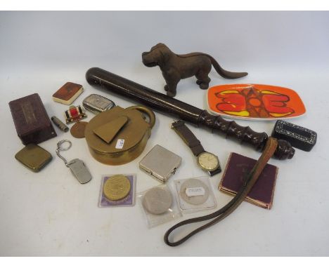 A box of mixed collectables to include a wooden truncheon, a Poole pottery dish, a nut cracker in the form of a dog etc. 